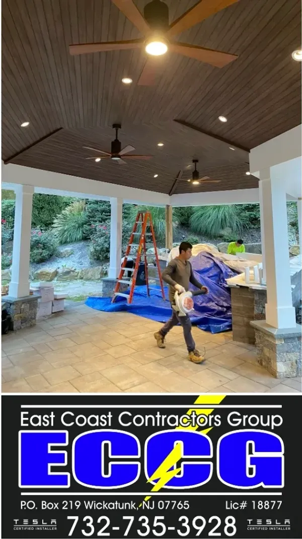 Covered patio with recessed lighting and ceiling fans wired by ECCG